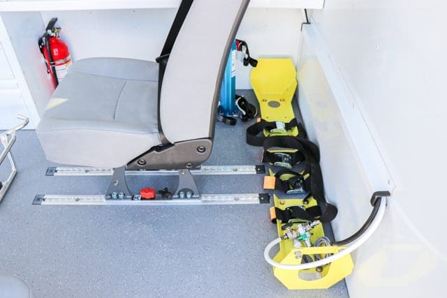Oxygen bottle holder in NEMT van